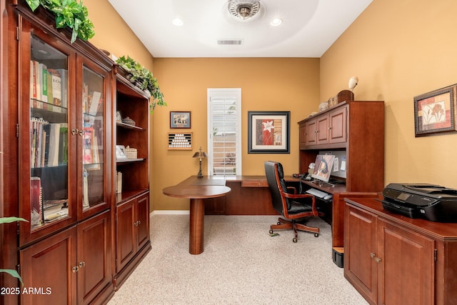 office space featuring baseboards, recessed lighting, visible vents, and light colored carpet