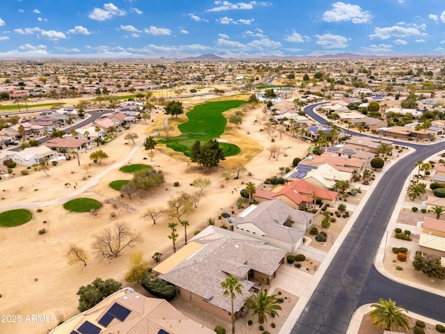 birds eye view of property with a residential view, view of golf course, and a mountain view