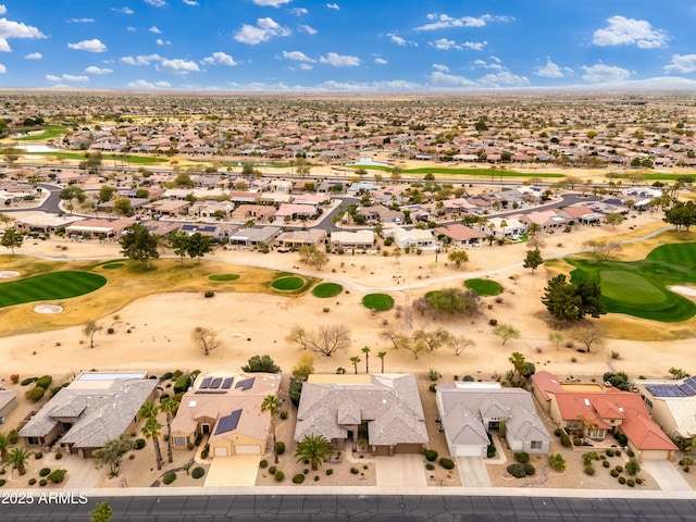 drone / aerial view featuring a residential view and golf course view