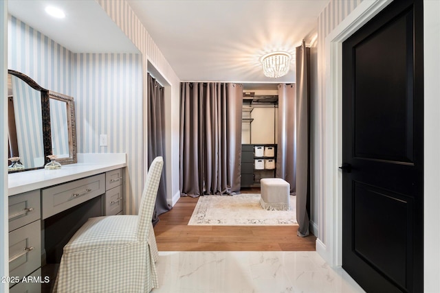 bathroom featuring vanity and wood-type flooring