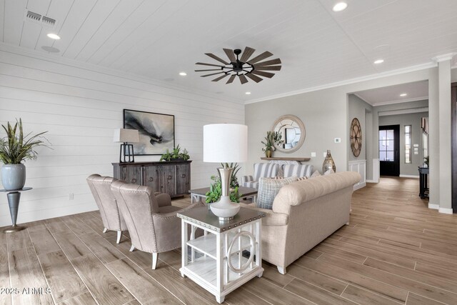 1145 E Gleneagle Dr, Chandler, AZ 85249 - living room with ceiling fan, wood finished floors, recessed lighting, ornamental molding, and baseboards