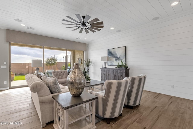 1145 E Gleneagle Dr, Chandler, AZ 85249 - living area featuring wood finished floors, a ceiling fan, wood ceiling, wooden walls, and recessed lighting