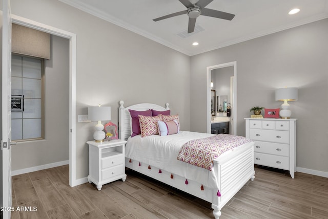 1145 E Gleneagle Dr, Chandler, AZ 85249 - bedroom with crown molding, light wood-style floors, baseboards, recessed lighting, and ensuite bathroom