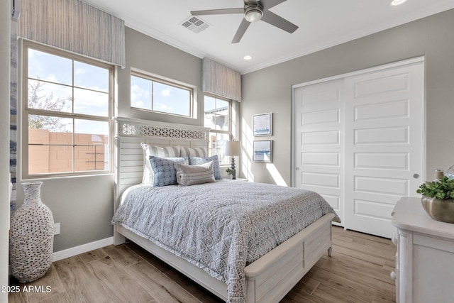 1145 E Gleneagle Dr, Chandler, AZ 85249 - bedroom with crown molding, a closet, baseboards, wood finished floors, and recessed lighting