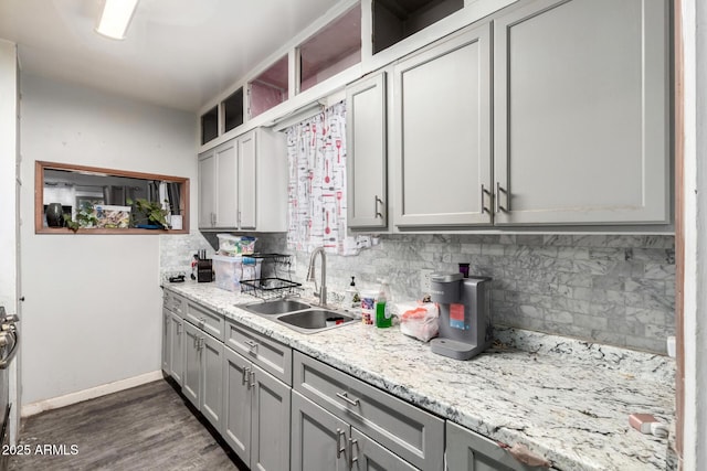 9353 W Monroe St, Tolleson, AZ 85353 - kitchen featuring a sink, gray cabinets, backsplash, and dark wood-style floors
