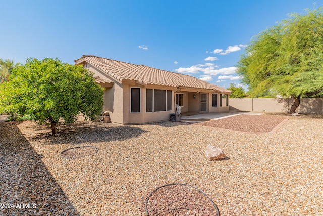 rear view of property with a patio