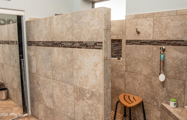 room details with a tile shower