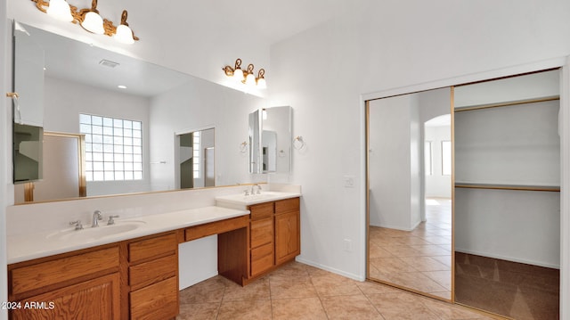 bathroom with vanity and tile patterned floors