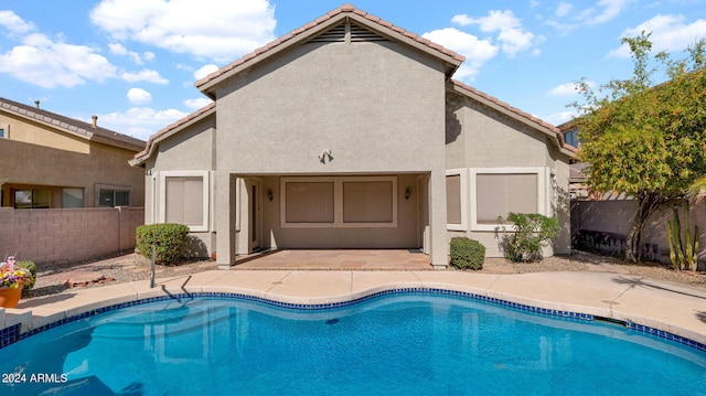 view of pool featuring a patio