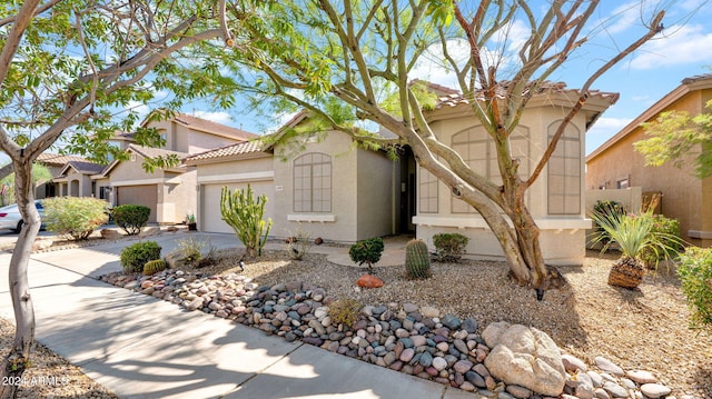 view of front of property with a garage