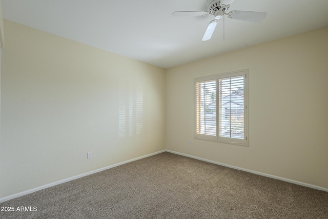 6010 E Greenway Ln, Scottsdale, AZ 85254 - carpeted empty room with a ceiling fan and baseboards