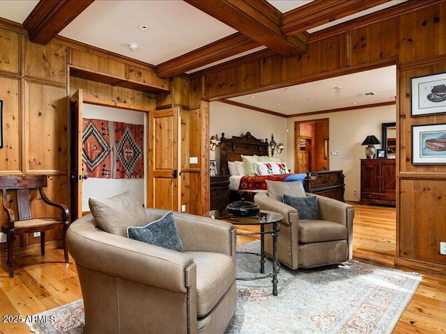 8022 N Ironwood Dr, Paradise Valley, AZ 85253 - living area featuring beam ceiling, light wood-style floors, ornamental molding, and wooden walls