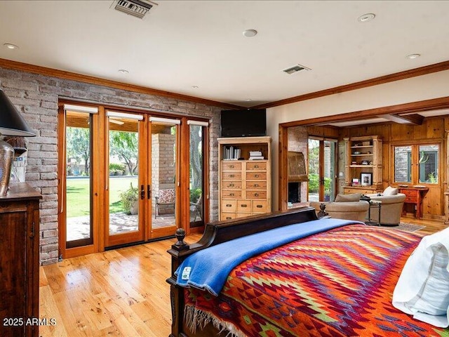 8022 N Ironwood Dr, Paradise Valley, AZ 85253 - bedroom with french doors, access to exterior, ornamental molding, and wood finished floors