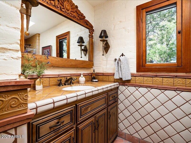 8022 N Ironwood Dr, Paradise Valley, AZ 85253 - bathroom with vanity, healthy amount of natural light, and tile patterned floors