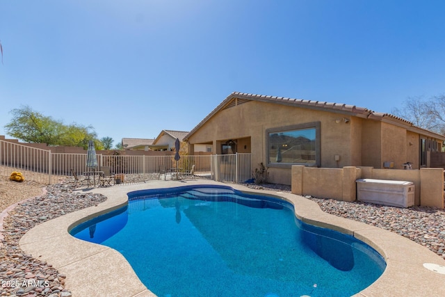 view of pool featuring a patio area, a fenced in pool, and fence