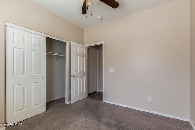 unfurnished bedroom with a closet, baseboards, carpet, and a ceiling fan