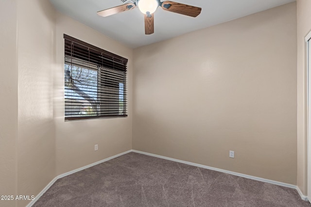 unfurnished room featuring a ceiling fan, baseboards, and carpet floors