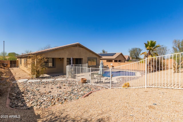 single story home with a patio area, a fenced backyard, and stucco siding