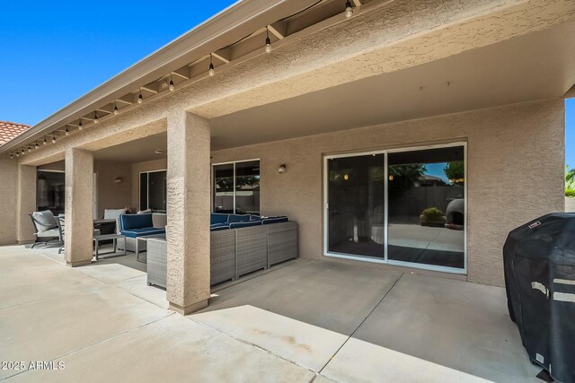 view of patio featuring an outdoor hangout area and grilling area