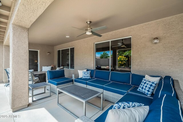 view of patio featuring ceiling fan and an outdoor hangout area