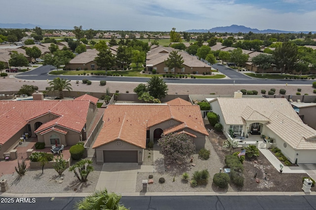 aerial perspective of suburban area featuring a mountainous background