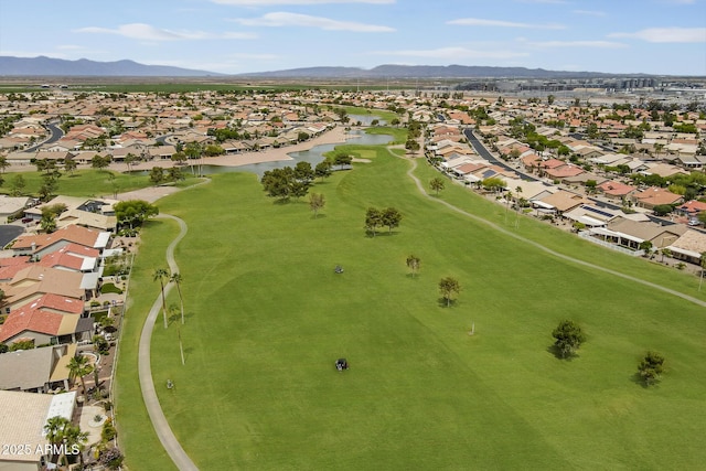 aerial perspective of suburban area featuring a water and mountain view and a golf club