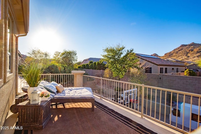 balcony featuring a mountain view