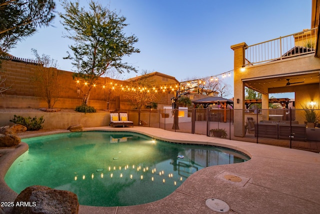 view of pool featuring a fenced backyard and a patio