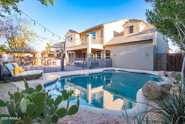 view of swimming pool with a patio, a fenced backyard, and a fenced in pool