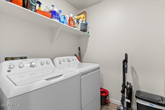 17461 W Molly Ln, Surprise, AZ 85387 - laundry room featuring washing machine and dryer, light wood-type flooring, and baseboards