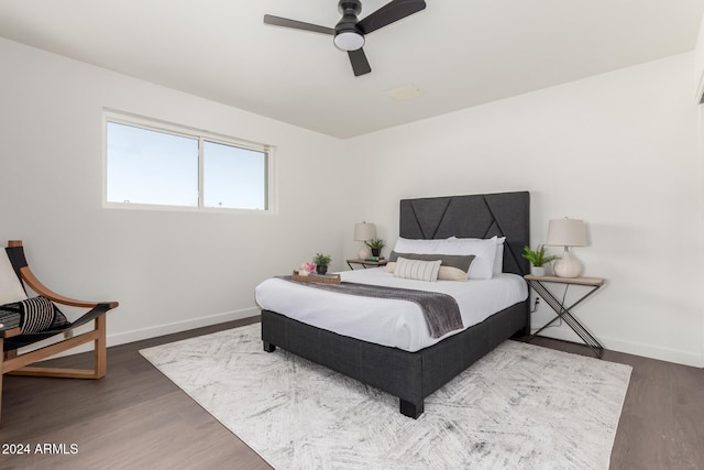 bedroom featuring ceiling fan and hardwood / wood-style flooring