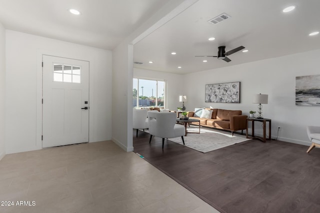 entrance foyer with ceiling fan