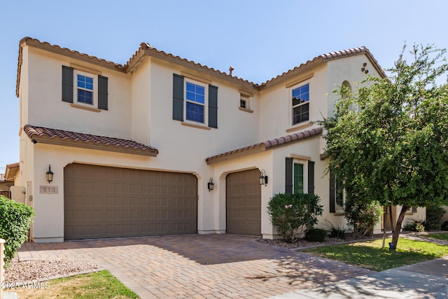 913 W Yosemite Dr, Chandler, AZ 85248 - mediterranean / spanish-style house with a garage, a tiled roof, and stucco siding