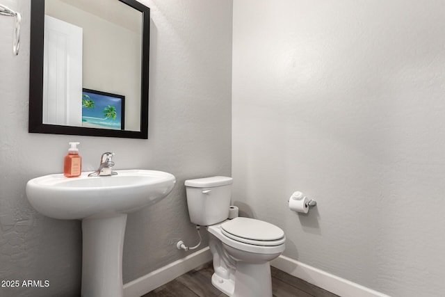 913 W Yosemite Dr, Chandler, AZ 85248 - half bathroom featuring wood finished floors, toilet, and baseboards