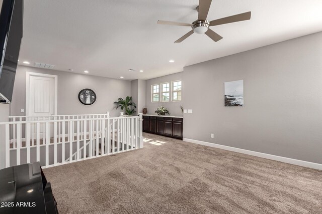 913 W Yosemite Dr, Chandler, AZ 85248 - unfurnished room with a ceiling fan, light colored carpet, recessed lighting, and baseboards