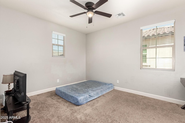 913 W Yosemite Dr, Chandler, AZ 85248 - unfurnished bedroom featuring baseboards, carpet flooring, and ceiling fan