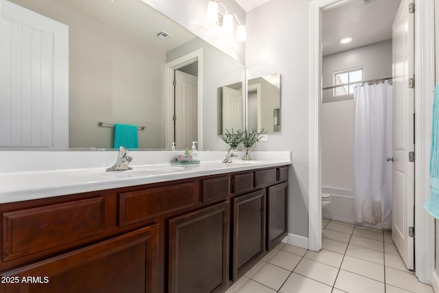 913 W Yosemite Dr, Chandler, AZ 85248 - bathroom with double vanity, toilet, tile patterned flooring, and shower / bath combo with shower curtain