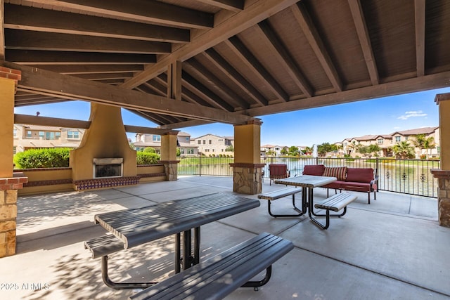 913 W Yosemite Dr, Chandler, AZ 85248 - view of patio / terrace with a large fireplace and a residential view