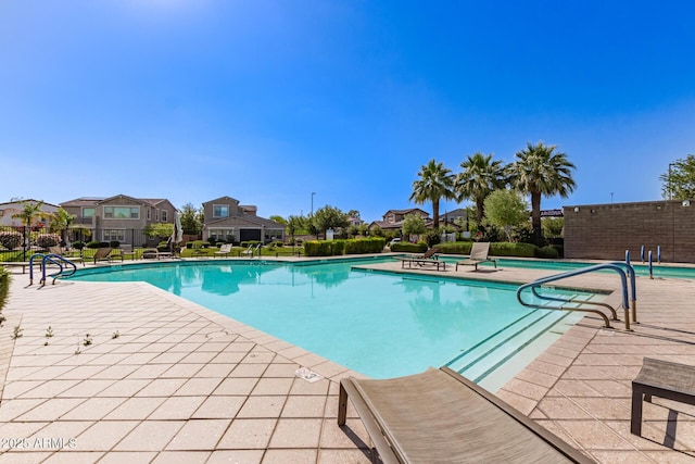 913 W Yosemite Dr, Chandler, AZ 85248 - community pool featuring a patio