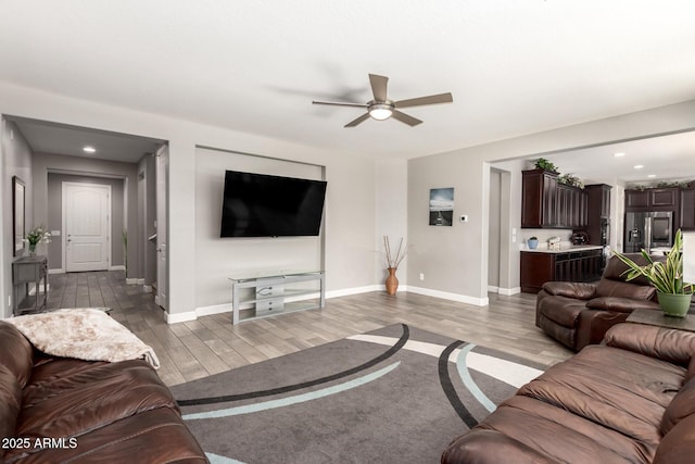 913 W Yosemite Dr, Chandler, AZ 85248 - living room with ceiling fan, wood finished floors, baseboards, and recessed lighting