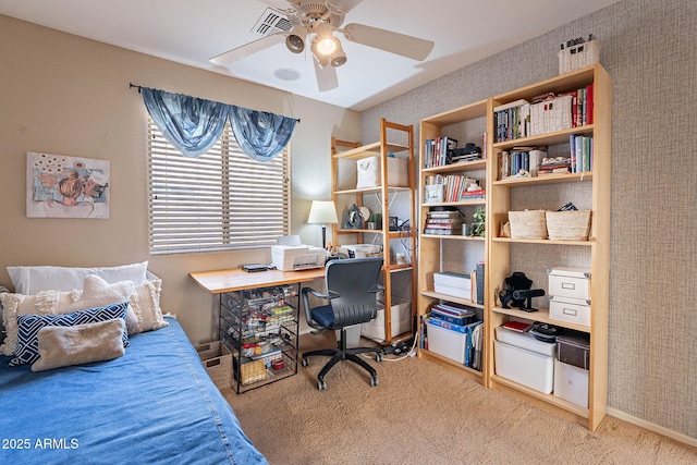 carpeted bedroom with ceiling fan