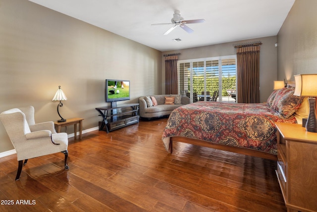 bedroom with dark wood-type flooring and ceiling fan