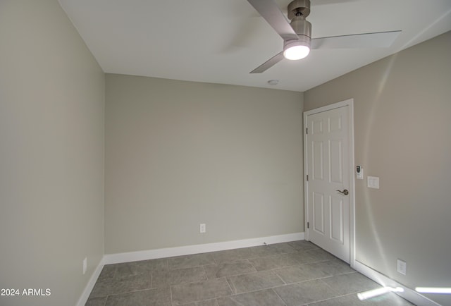 spare room featuring ceiling fan