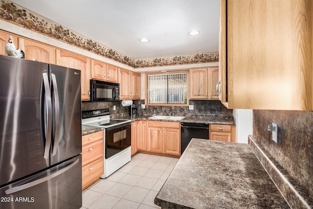 kitchen featuring light tile floors, light brown cabinetry, black appliances, backsplash, and sink