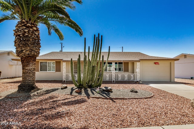 single story home featuring a garage