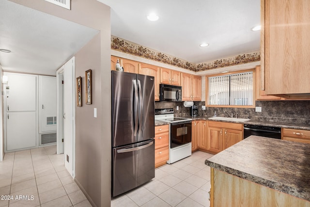 kitchen with light brown cabinets, light tile floors, black appliances, backsplash, and sink