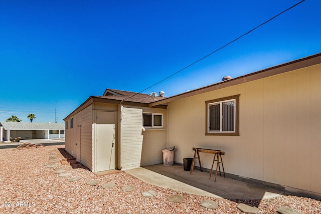 back of house featuring a patio area