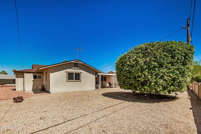 rear view of property with a patio area