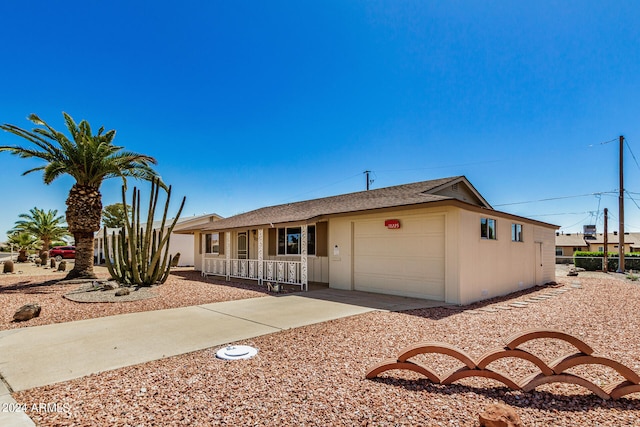 ranch-style home with a garage