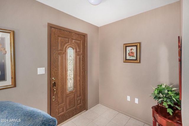 foyer with light tile floors